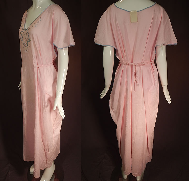 Vintage Peer Nities Hand Made Porto Rico Pink Linen Embroidered Nightgown NWT
This beautiful boudoir nightgown is loose fitting, a long floor length, with a V front blue trim neckline, short flared cap sleeves and an adjustable attached belted back tie sash. The nightgown is a large size measuring 53 inches long, with a 56 inch bust, 64 inch waist and 64 inch hips.