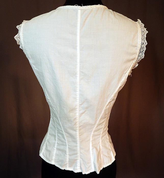 Victorian Lolita Lingerie White Cotton Lace Trim Camisole Corset Cover Top
It is in good condition, with only a few loose threads around the neckline. This is truly a wonderful piece of antique Victoriana lingerie wearable art!