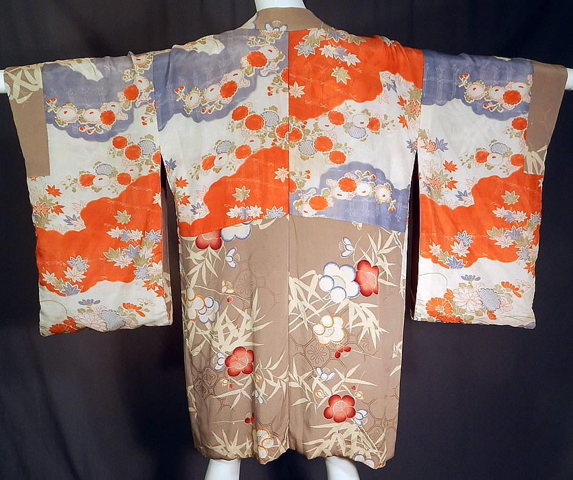 Vintage Japanese Silk Screen Plum Blossom Reversible Haori Kimono Robe Jacket
It is made of a brownish gray taupe color silk fabric with a silk screen design of plum blossom flowers, bamboo leaves, Japanese maple leaves, a honeycomb pattern background and gold, silver metallic thread couching work outlining some flowers. 