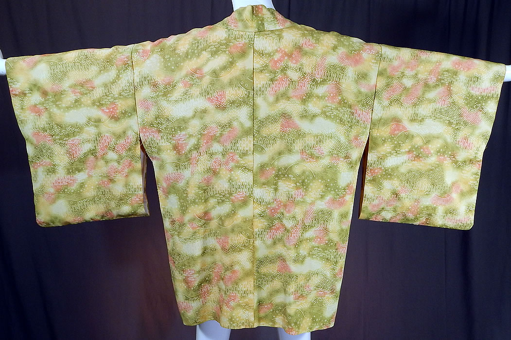 Vintage Japanese Silk Chartreuse Green Pink Ombre Haori Kimono Robe Jacket
It is made of a bright yellowish green chartreuse color and pink pastel ombre silk tie-dye fabric with a silk screen print design of tiny flowers, leaves and waves. 