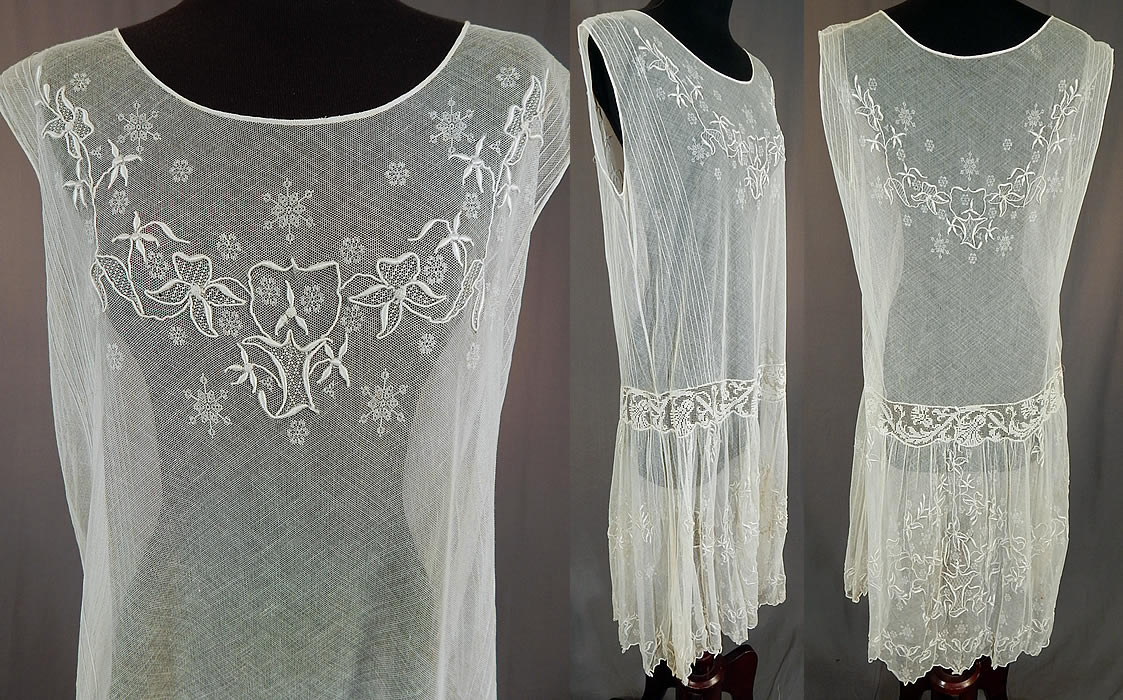 Vintage White Tulle Net Snowflake Embroidered Filet Lace Drop Waist Chemise Dress
The dress measures 40 inches long, with a 36 inch bust, 36 inch waist and 46 inch hips. It is in good condition, has not been laundered with only a few faint tiny age spots and pin holes. This is truly a wonderful piece of wearable lace art!