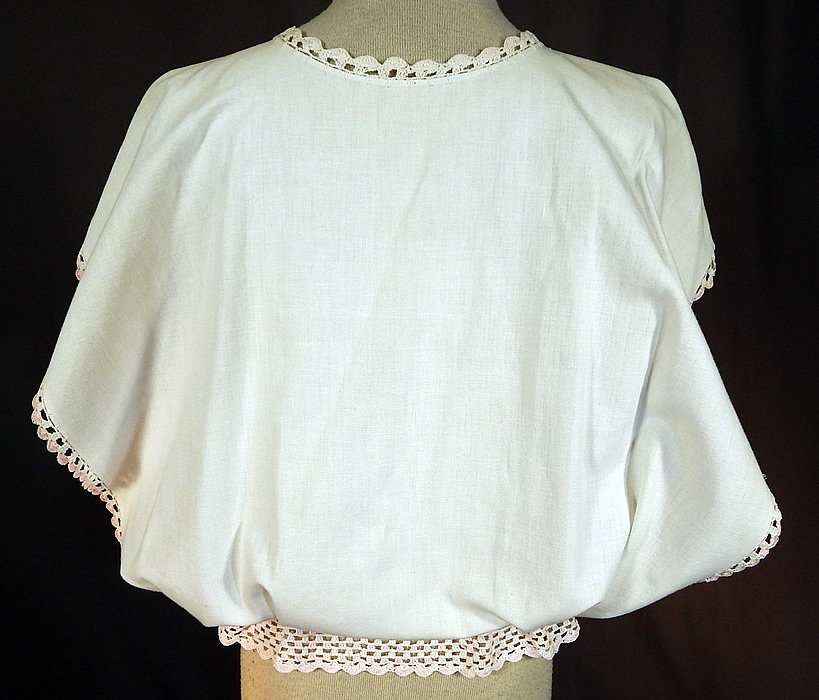 Edwardian White Linen Pastel Embroidered Crochet Lace Combing Bed Jacket
The jacket measures 21 inches long, with a 38 inch chest and 24 inch waist. It is in excellent condition. This is truly a wonderful piece of wearable art! 