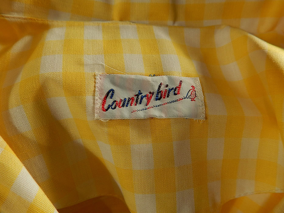 Vintage Country Bird Yellow & White Cotton Check Gingham Dress NWT
There is a "Country Bird" label sewn inside and original paper tags still attached. The dress measures 39 inches long, with a 42 inch bust, 38 inch waist, 16 inch back and size 20 tag inside. 
