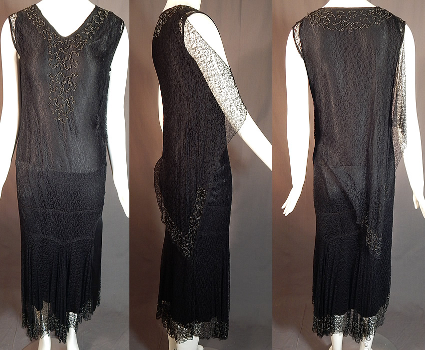 Vintage Black Silk Cobweb Lace Beaded Bias Cut Asymmetrical Evening Gown Goth Dress
This vintage black silk cobweb lace beaded bias cut asymmetrical evening gown goth dress dates from the 1930s. It is made of a black sheer fine cobweb lace fabric, with dark charcoal gray iridescent beading done in a spiraling scrolling pattern design around the neckline, back corner of the capelet and the bottom skirt hemline.