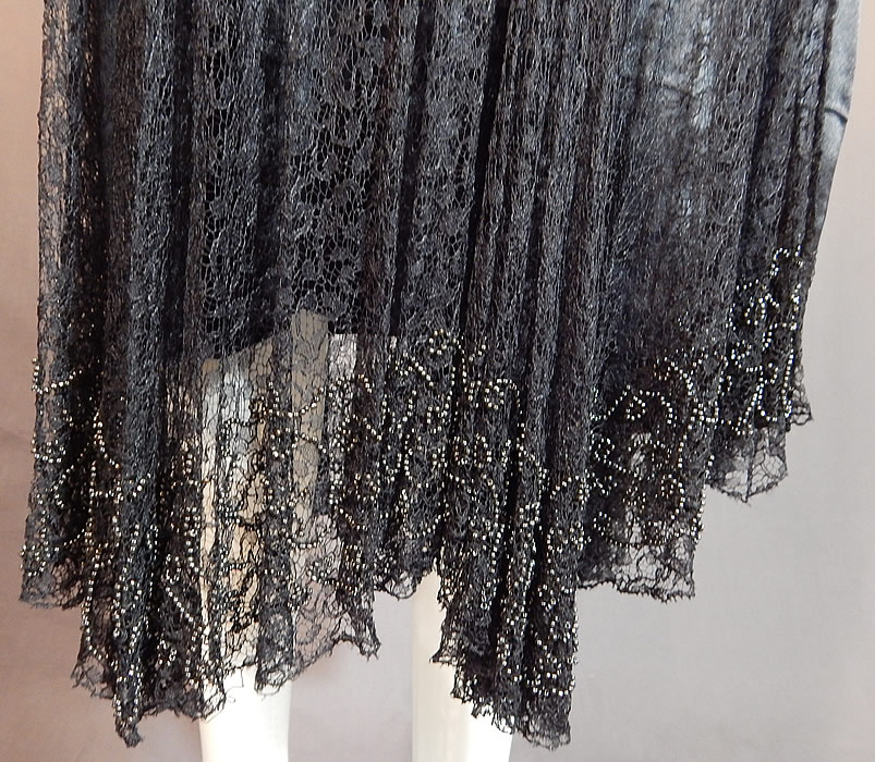 Vintage Black Silk Cobweb Lace Beaded Bias Cut Asymmetrical Evening Gown Goth Dress
It is in good condition, with only a few small frayed holes in the lace which are difficult to see. 