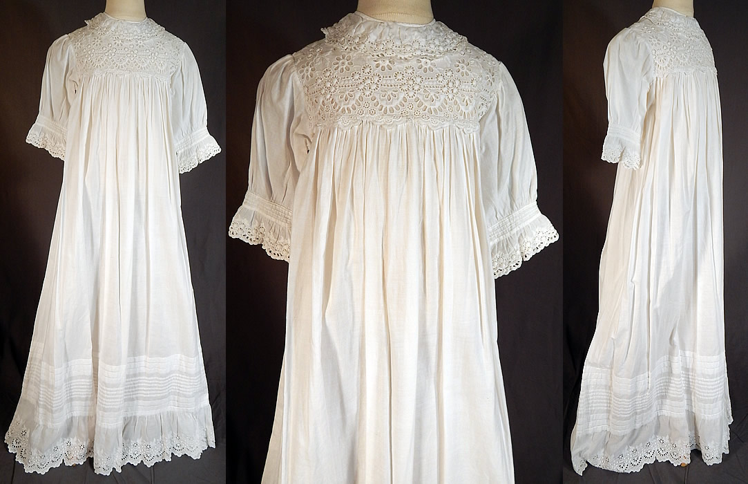 Victorian Broderie Anglaise Eyelet Cotton Batiste Baptism Christening Gown Dress
This antique Victorian era broderie anglaise eyelet cotton batiste baptism christening gown dress dates from 1900. It is made of a white cotton batiste fabric, with a broderie anglaise eyelet embroidery cutwork whitework lace yoke, collar, cuffs and bottom skirt hem with additional pleated details. 