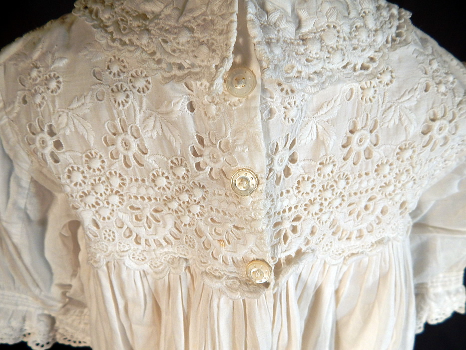 Victorian Broderie Anglaise Eyelet Cotton Batiste Baptism Christening Gown Dress
This beautiful baby baptismal christening gown dress has a long loose fitting full skirt, small rounded fold over collar, long sleeves, mother of pearl button closures on the back top and is unlined. 