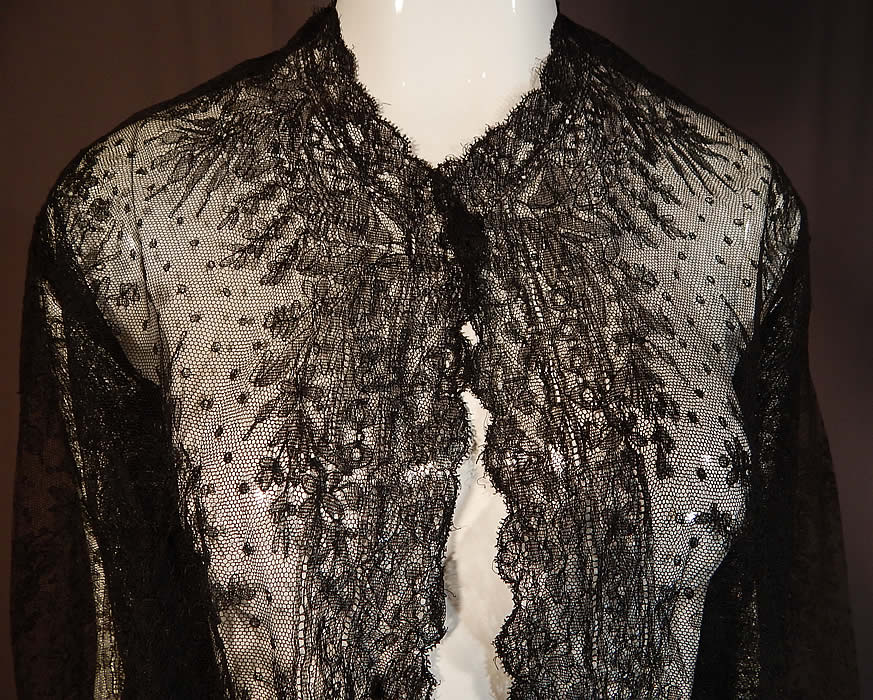 Victorian Antique Black Chantilly Lace Shawl Wide Pagoda Sleeve Jacket
It is made of a sheer fine delicate black net French Chantilly lace, with a Swiss dot, floral foliage leaf pattern outlined in black threads with detailed shading effects and a decorative scalloped border edging. 