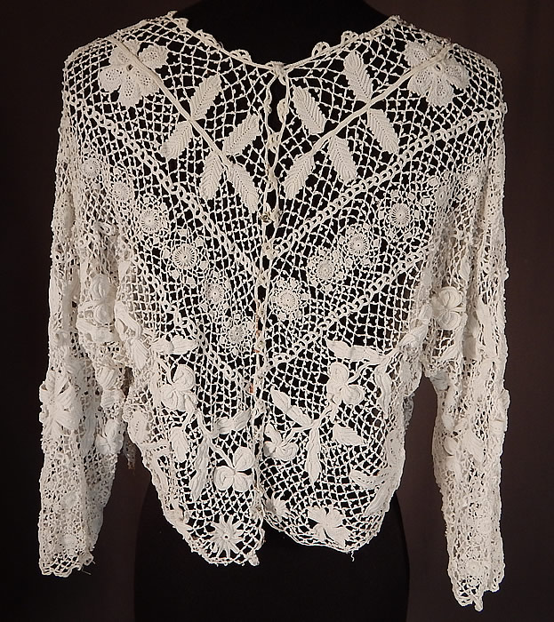 Edwardian Antique White Floral Meshwork Irish Crochet Lace Blouse
The top measures 16 inches long, with a 40 inch bust and 40 inch bottom waist. 