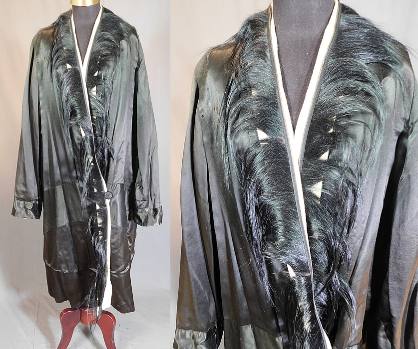Vintage Art Deco Black Silk Fur Trim Flapper Cocoon Opera Coat Evening Jacket
This rare amazing vintage Art Deco black silk fur trim flapper cocoon opera coat evening jacket dates from the 1920s. It is made of a lustrous black silk satin charmeuse fabric with black fur trim edging the neckline and front opening.