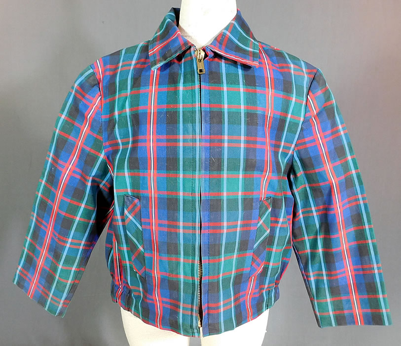 Vintage Childs Cotton Plaid Tartan Boys Retro Rockabilly Ricky Jacket
This vintage child's cotton plaid tartan boys retro rockabilly Ricky jacket dates from the 1950s. It is made of a red, green and blue cotton canvas fabric, with a checkered tartan plaid pattern. 