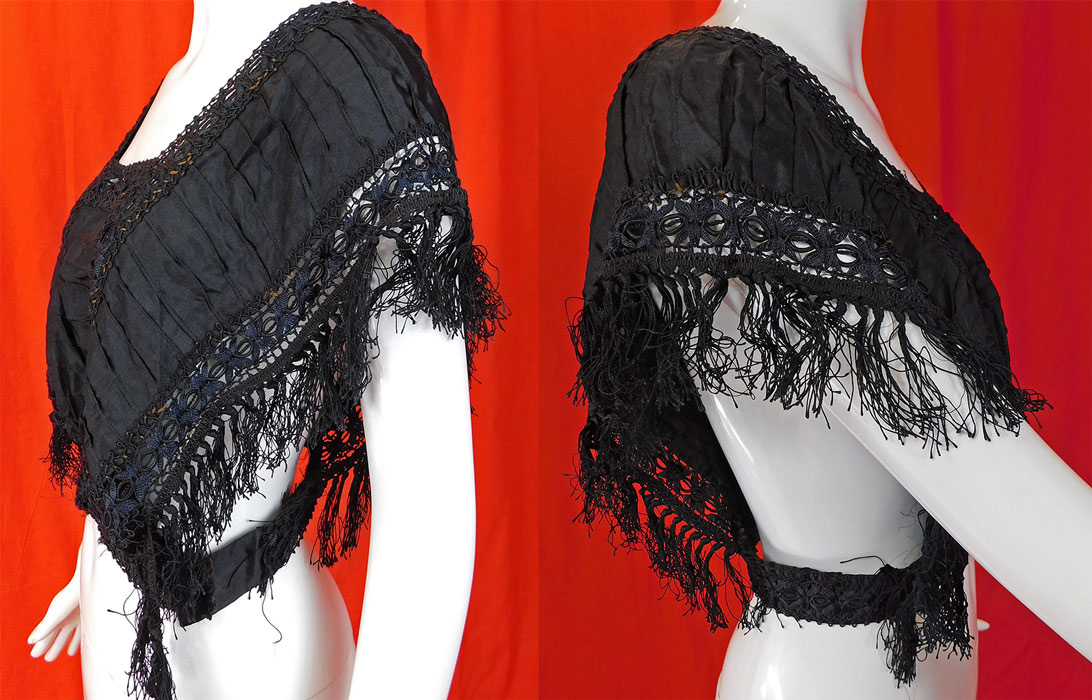 Victorian Black Silk Ruched Pleated Lace Fringe Trim Blouse Bodice Tabard Top
The top measures 19 inches long, with a 40 inch bust and 30 inch waist. 