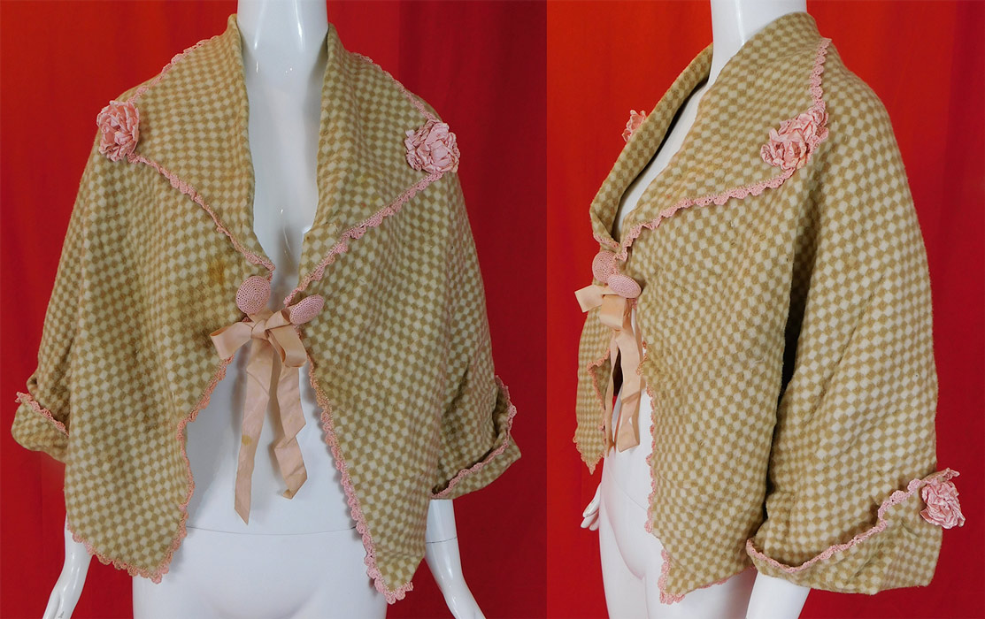 Victorian Beige & White Checked Flannel Morning Robe Bed Jacket Cape
This marvelous morning robe combing bed jacket is a short mid length with a loose fitting cape style, with slight set sleeves attached underneath with pink crochet straps, rolled cuffs, a fold over lapel collar, pink crochet covered button ribbon tie front closure and is unlined