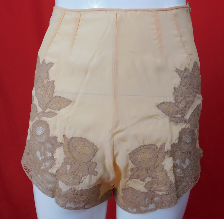 Vintage Zipanty Pink Silk Ecru Lace Trim Tap Pants Panties Lingerie
This lovely lace lingerie tap pants panties, knickers, bloomers have a full short pant leg, pleated details on the front waist, a side zipper closure and is unlined.