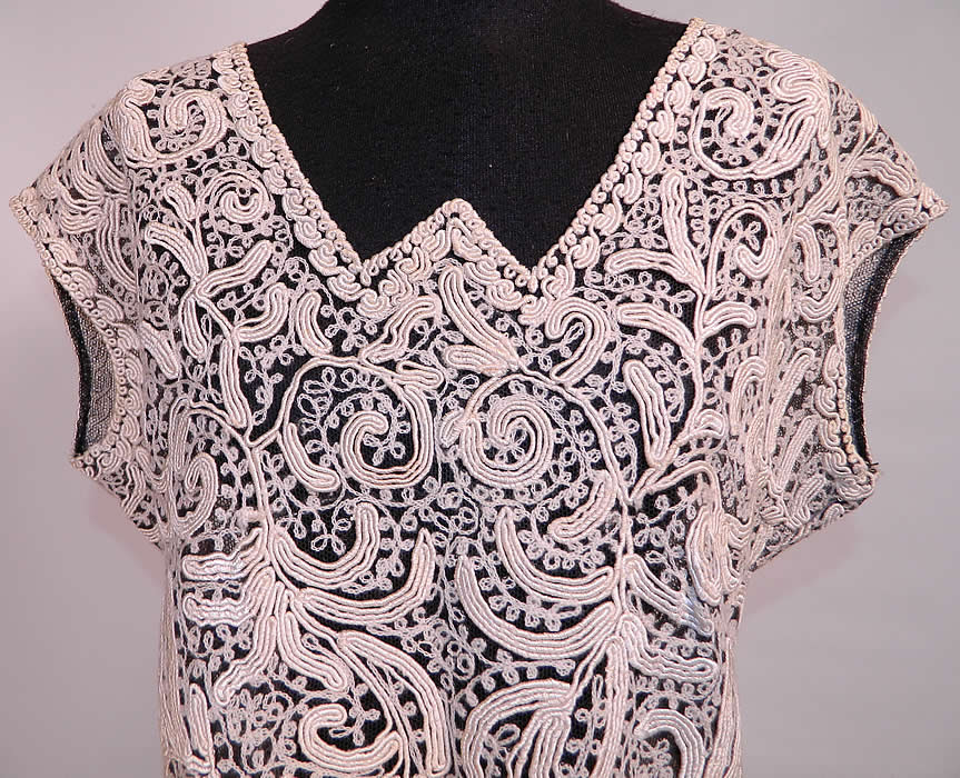 Vintage Italy Black Net Cream Soutache Embroidered Lace Dress Blouse & Skirt Set. The top measures 21 inches long, with a 34 inch waist and 38 inch bust. There is a matching embroidered fabric pencil skirt, sheer, unlined, with side slits and zipper closure. The skirt measures 25 inches long, with 34 inch hips and a 28 inch waist. Both are in good condition, but have not been cleaned, the top has a small faint age spot stain on the front. This is truly a wonderful piece of wearable lace textile art!