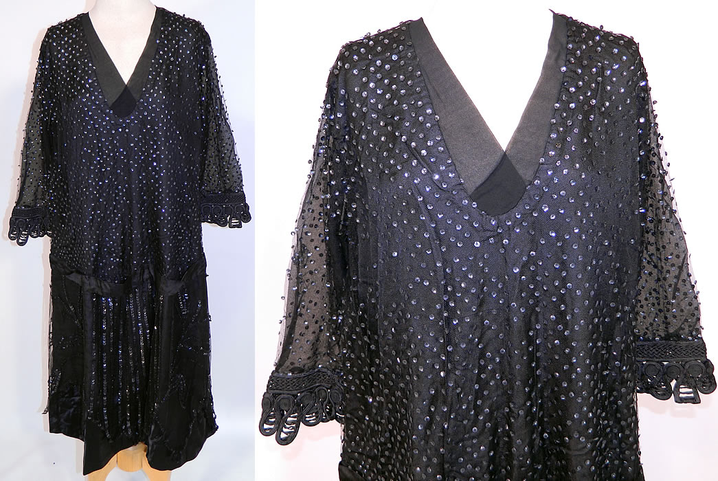 Vintage Black Silk Net Sequin Beaded Drop Waist Flapper Dress Large Size. This vintage Art Deco black silk net sequin beaded drop waist flapper dress dates from the 1920s. It is made of a black silk satin fabric underdress, with a sheer black net overlay and black sequin beading covering it.