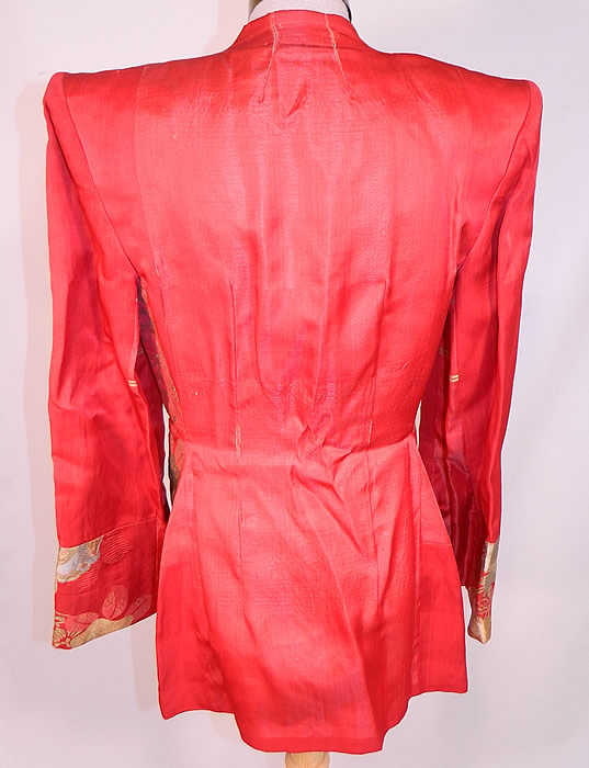 Vintage Japanese Kimono Obi Red Silk Gold Lame Broad Shoulder Jacket Lamé
The jacket measures 28 inches long, with 36 inch hips, a 26 inch waist, 34 inch bust, 15 inch back and 23 inch long sleeves. It is in good condition, with only a small frayed seam on the back. This is truly a wonderful piece of wearable Japanese textile art!