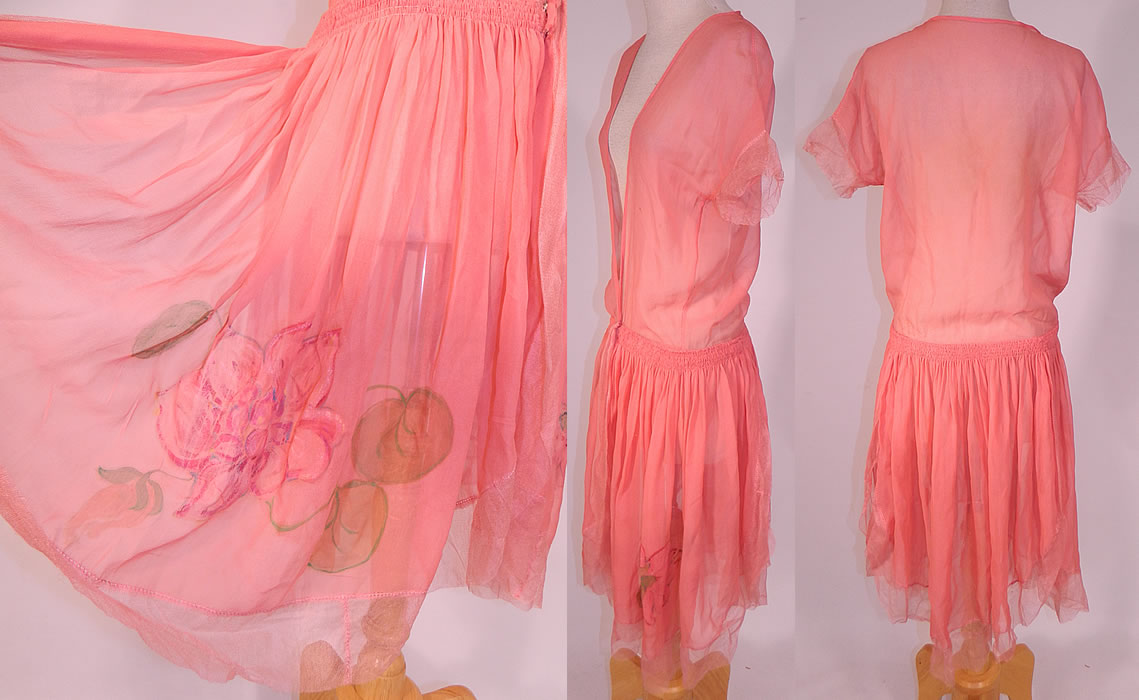 Vintage Hand Painted Lotus Flower Petal Skirt Coral Pink Silk Chiffon Dress Robe
This pretty pink peignoir robe style dress has an open front top and skirt, with smocking, tucks, gathers around the drop waist, a snap closure on the front, short sleeves, a mesh net fabric trim edging on the sleeve cuffs, bottom scalloped skirt hem and is sheer completely unlined. 