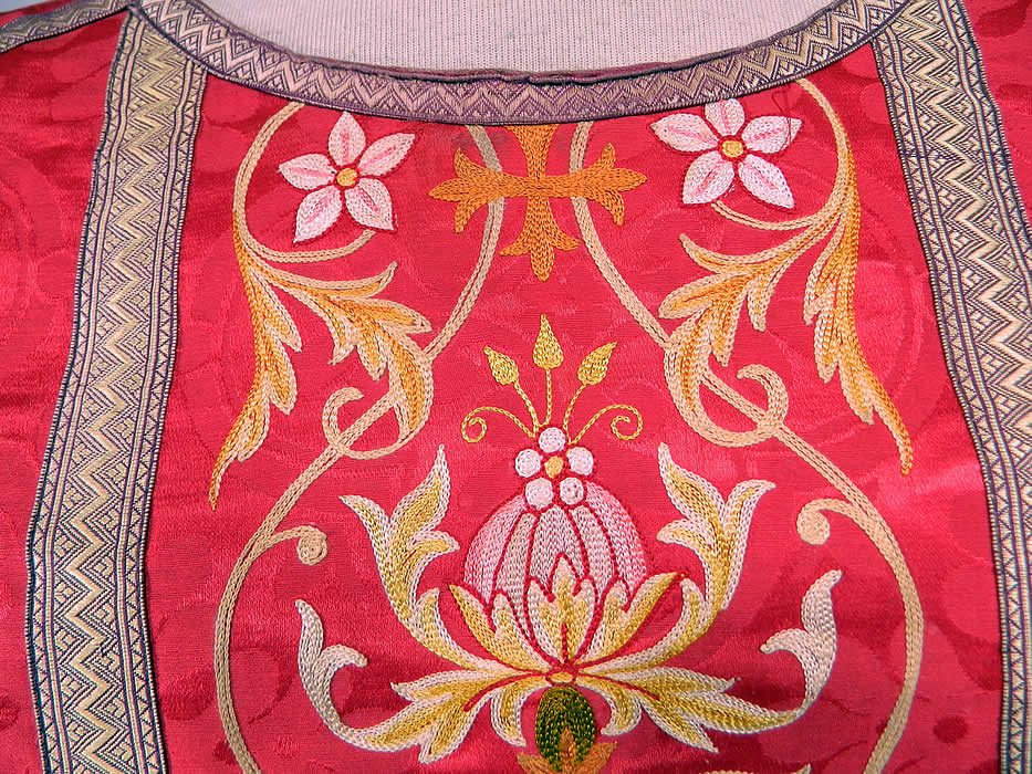 Antique Religious Red Silk Brocade Embroidered Priests Vestment Chasuble Poncho
It is made of a red silk damask weave brocade fabric with a woven floral pattern, colorful chain stitch embroidery work done in a floral fancy rococo design and gold metallic lamé trim edging, creating a cross on the back.