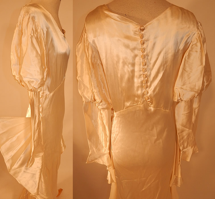 Vintage White Silk Satin Bias Cut Wedding Gown Dress Long Train Skirt
It is in good condition, but has not been cleaned, with a few faint small stains on the front top and has snaps inside the neckline. This is truly an amazing piece of wearable wedding bridal art!