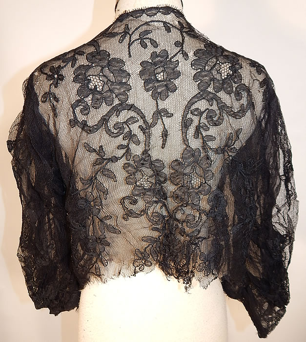 Victorian Antique Black Chantilly Lace Net Bodice Blouse Shirt Jacket Top
The top measures 18 inches long, with a 30 inch waist, 34 inch bust and 17 inch long sleeves. 