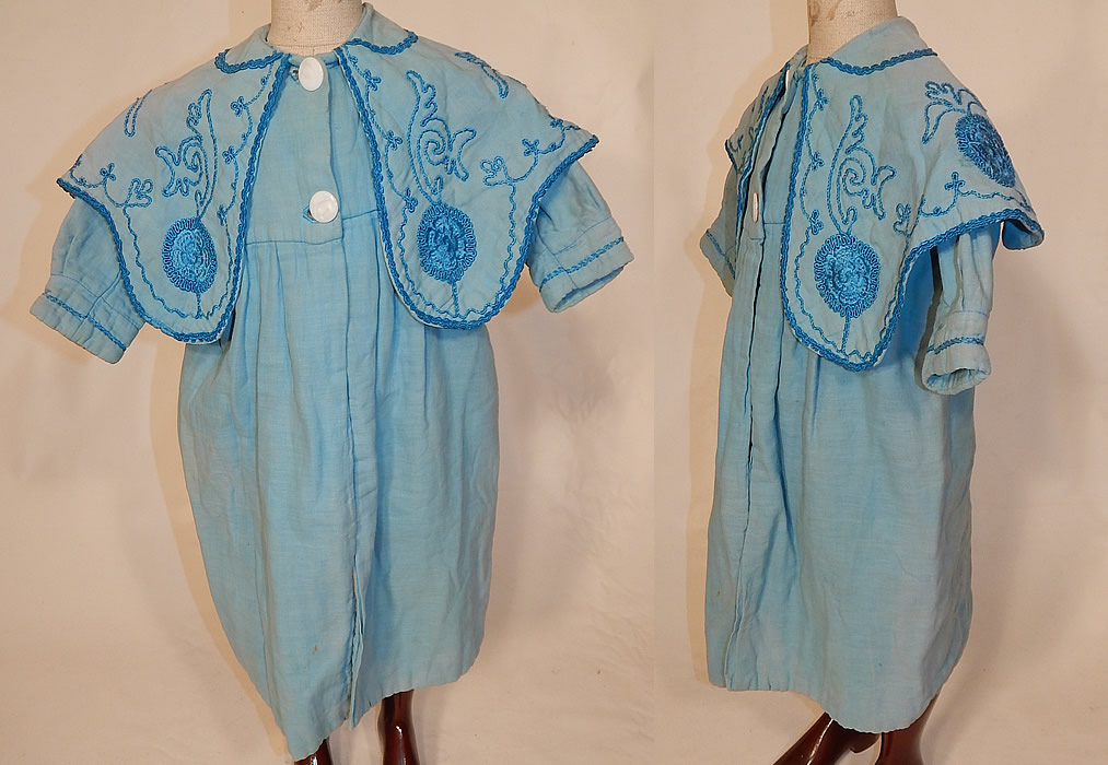 Edwardian Blue Embroidered Soutache Braided Trim Childs Winter Coat
This antique Edwardian era blue embroidered soutache braided trim child's winter coat dates from 1910. It is made of a blue soft cotton fabric, with a slightly darker shade of blue silk soutache embroidered braided rope trim along the collar and sleeve cuffs.