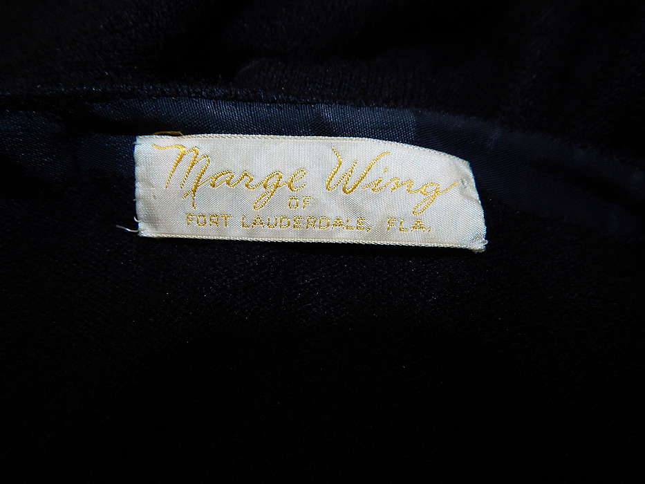 Vintage Marge Wing Black Cashmere Gold Hand Painted Magnolia Cardigan Sweater
There is a "Marge Wing of Fort Lauderdale, FLA." label sewn inside. It is in excellent condition. This is truly a wonderful piece of hand painted wearable art!