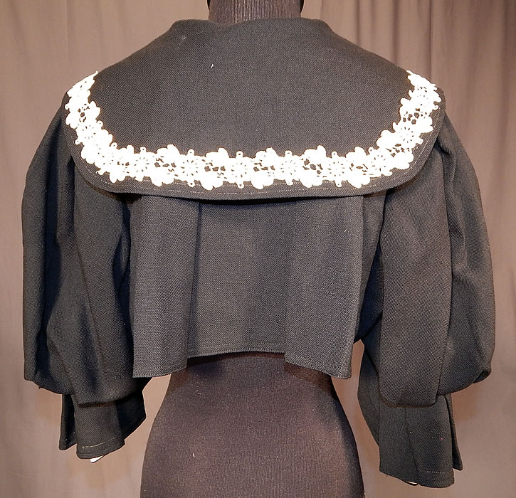 Victorian Box Pleat Black Wool White Lace Bolero Spencer Jacket Cropped Top
The jacket measures 13 inches long, with a 36 inch bust and 13 inch long sleeves. 
