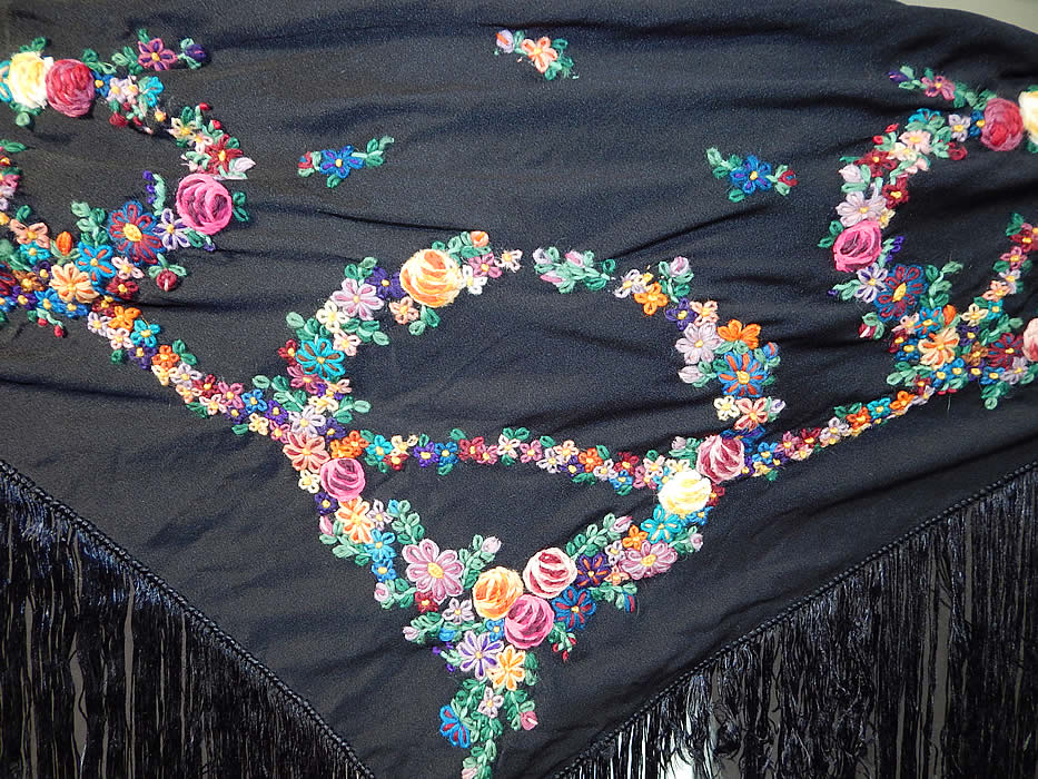 Vintage Black Silk Floral Garland Rosette Yarn Embroidered Fringe Shawl Scarf
The shawl measures 62 inches wide at the top, 29 inches long to the V point, with 22 inch long fringe. 