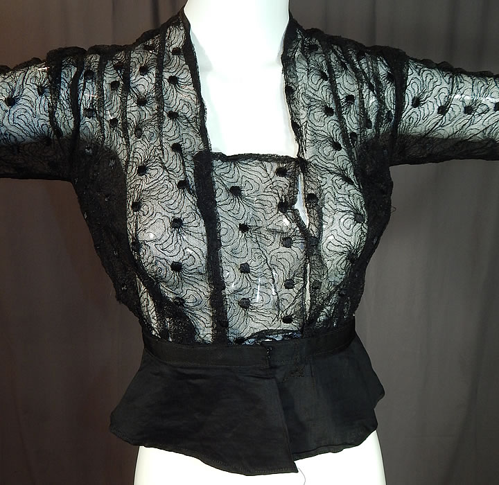 Edwardian Sheer Black Net Lace Embroidered Spiral Flower Blouse Shirt Top
This beautiful blouse has a squared low neckline, long fitted sleeves, a black cotton peplum skirted waist, snap closures along the front side and is sheer, unlined.
