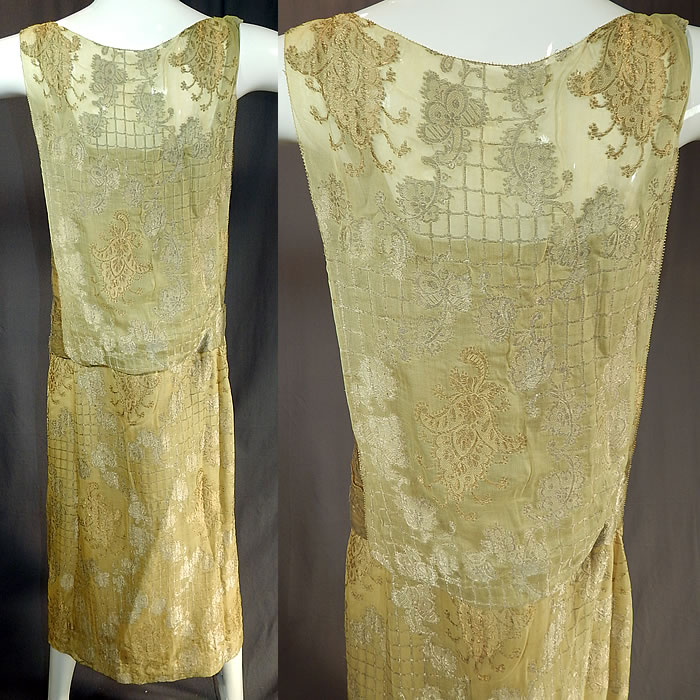 Vintage Art Deco Chartreuse Gold Lamé Lame Silk Damask Drop Waist Flapper Dress
This fabulous flapper dress has a loose fitting drop waist style, with gold lamé mesh lined open sides, sleeveless, front snap closures and is fully lined in a chartreuse green silk satin fabric inside. 