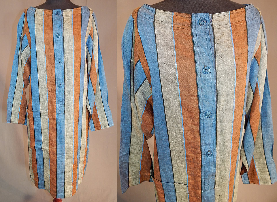 Vintage Christian Dior Sportswear Striped Chambray Linen Tunic Shirt Dress
This vintage Christian Dior Sportswear striped chambray linen tunic shirt dress dates from the 1980s. It is made of a brown, blue and gray striped pattern, chambray linen woven fabric.