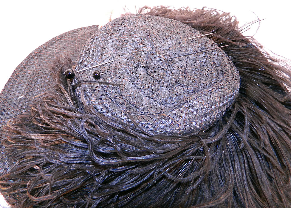 Edwardian Woven Black Straw Ostrich Feather Wide Brim Hat & Hatpins. It would have sat perched atop a Gibson Girl style up do hairdo and comes with two long hatpin's with black beaded glass tops.