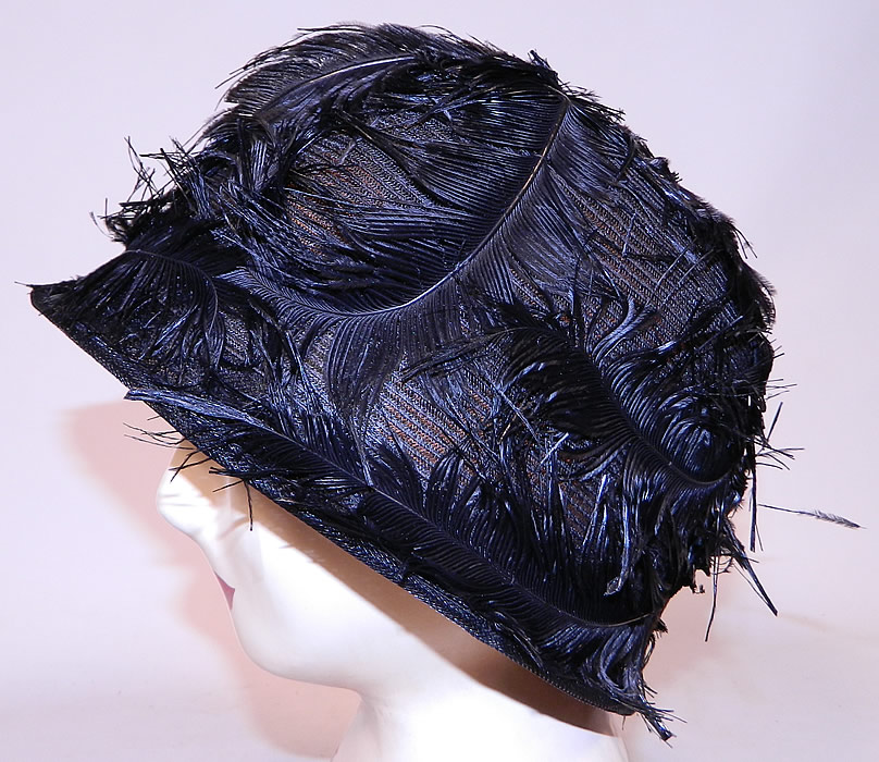 Vintage Black Feather Woven Horse Hair Straw Flapper Cloche Hat
The hat measures 22 inches inside crown circumference.