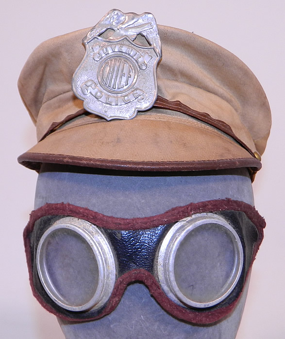 Vintage Childrens Juvenile Police Chief Toy Tin Badge Cap Hat & Motorcycle Goggles
This vintage children's Juvenile Police Chief toy tin badge cap hat and motorcycle goggles dates from the 1930s. 