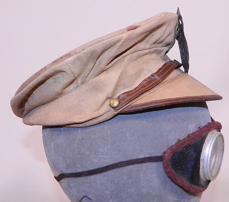 Vintage Childrens Juvenile Police Chief Toy Tin Badge Cap Hat & Motorcycle Goggles
Also included are a pair of motorcycle motoring driving goggles, with clear glass lenses, silver tone tin metal, leather trim edging and fabric side straps. 