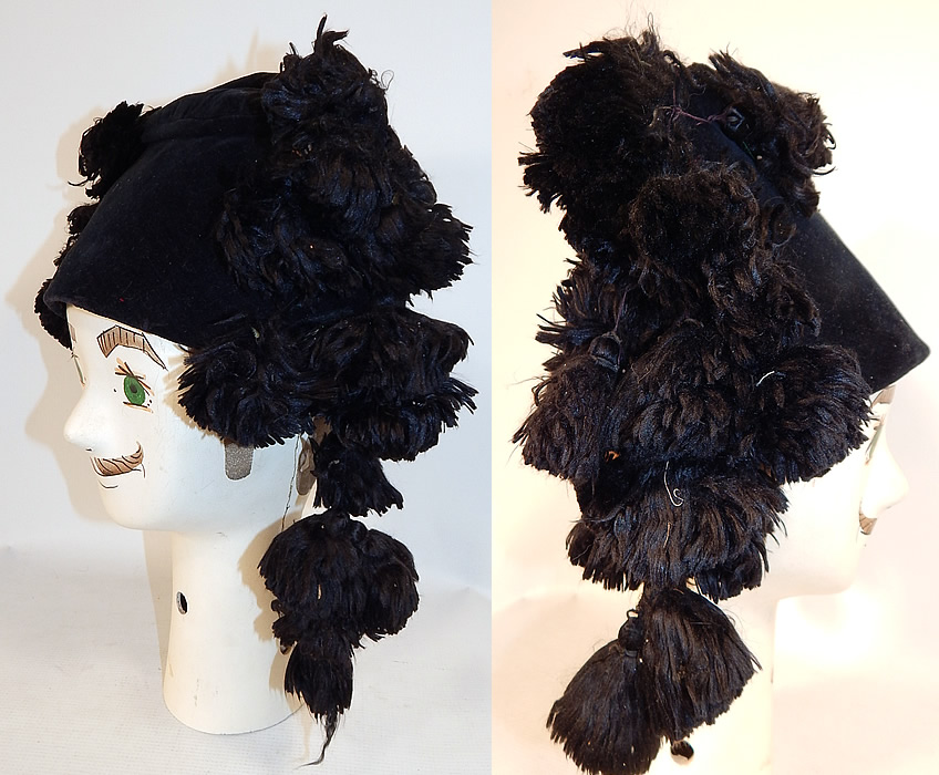 Vintage Black Velvet Silk Tassel Pompom Mens Bicorn Montera Matador Folk Costume  Hat
The hat measures 12 inches wide at the base, 5 inches tall and is 24 inches inside circumference. It is in good condition, with only some slight fraying along one side of the silk tassel pompoms (see close-up). This is a truly a rare and wonderful piece of European regional textile folk art!