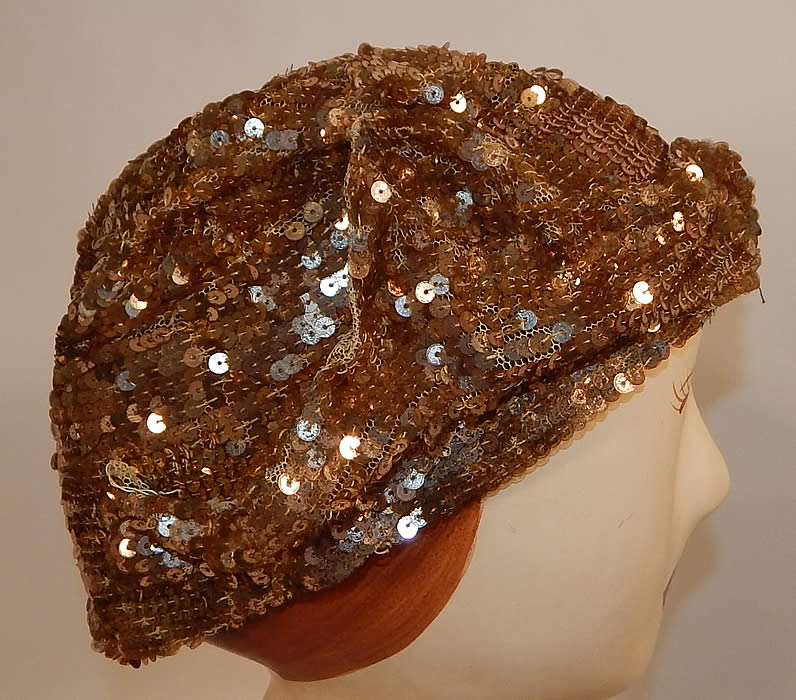 Vintage Frances Louise Hollywood Label Art Deco Gold Sequin Flapper Cloche Hat
This fabulous flapper cloche hat has a form fitting skull cap style, a rolled cuff brim and is sheer, unlined. 