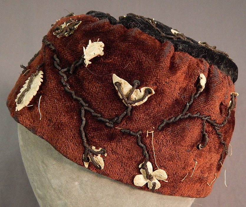 Victorian Gold Bullion Embroidered Brown Velvet Gentlemens Smoking Cap
It is hand stitched, made of a brown and black velvet fabric, with gold bullion hand embroidery work, gold sequin beading accenting white fabric cut out applique shapes of flowers, leaves, birds, heart and cross shapes.