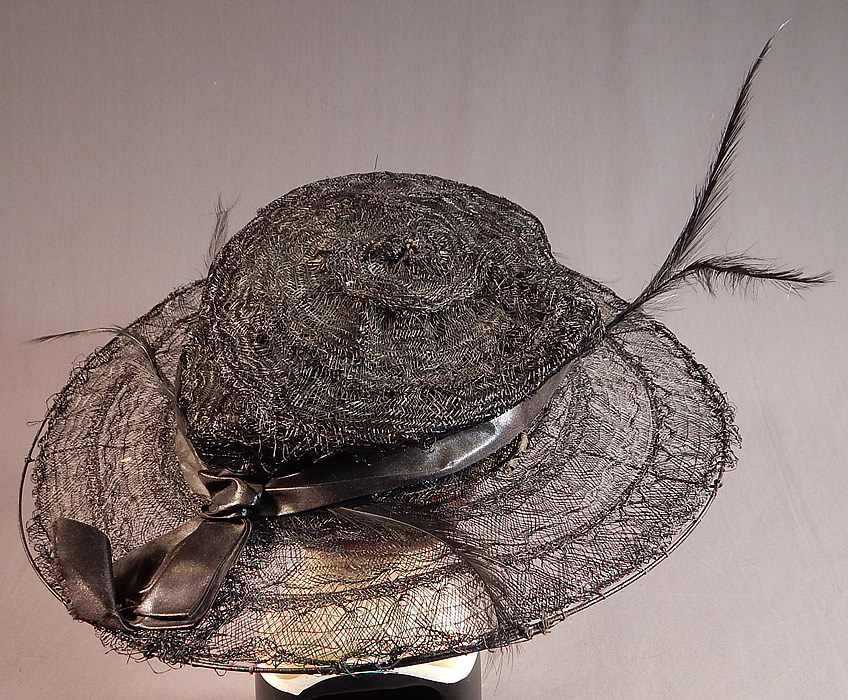 Edwardian Black Woven Horse Hair Crinoline Feather Trim Wired Wide Brim Hat
This beautiful black hat has a large flat round shape with a circular low round crown and is lined in a black cotton fabric inside
