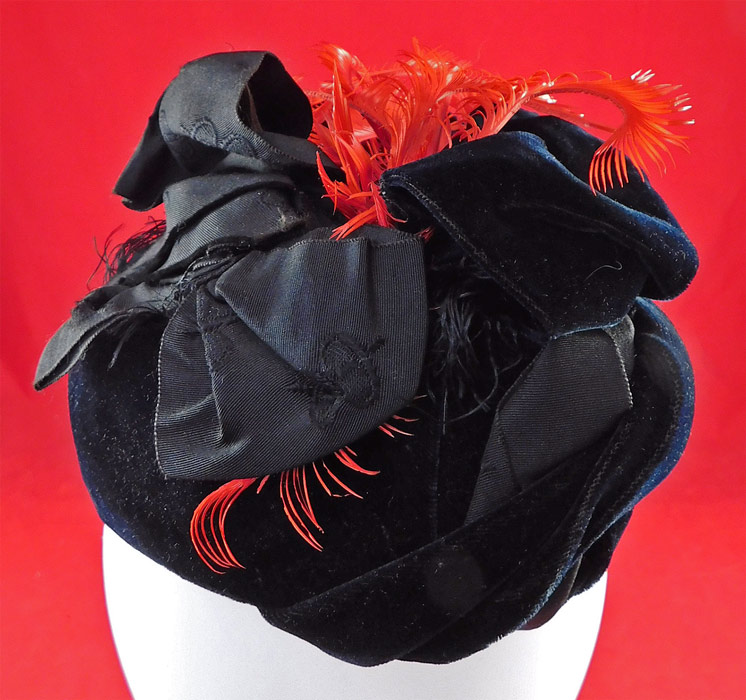 Victorian 1870s Black Velvet Red Feather Ribbon Trim Small Pork Pie Toque Traveling Hat
This is truly a wonderful piece of antique Victoriana wearable millinery art! 