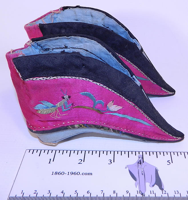 Antique Chinese Silk Embroidered Mantis & Bird Bound Foot Lotus Slipper Shoes.  The shoes measures 5 1/2 inches long, 1 inch wide on the front toes, 2 inches wide at the heel and are 3 inches high. For over a thousand years Chinese women's beauty was judged by the size of their feet. The ideal foot was three inches long and shaped like a lotus bud flower.