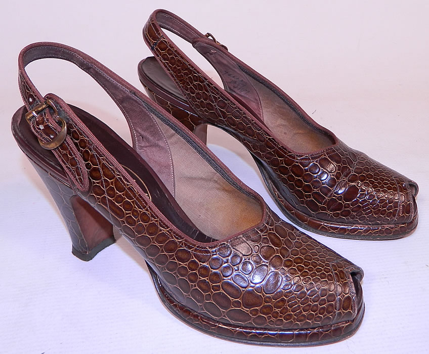 Vintage Laird Schober & Co Brown Leather Alligator Slingback Platform Shoes 
This pair of vintage Laird Schober & Co brown leather alligator slingback platform shoes date from the 1940s. 
