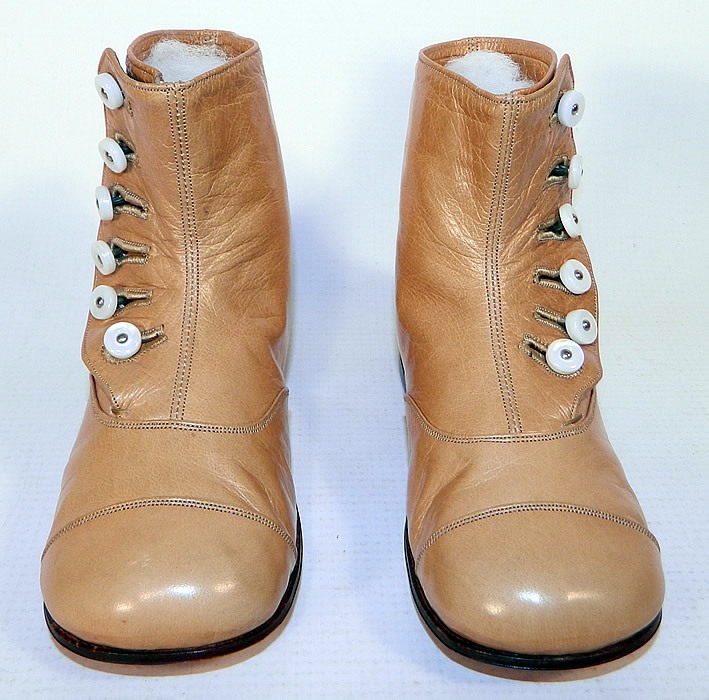 Unworn Victorian Tan Leather High Button Baby Boots Infant Childs Shoes
The boots measure 4 inches tall, 6 inches long and are 2 1/4 inches wide. 