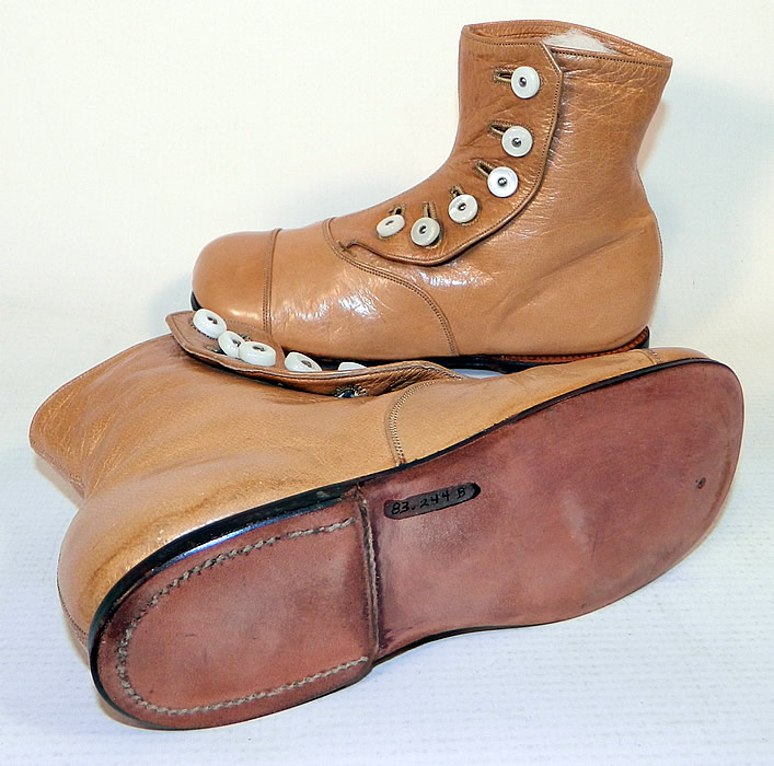 Unworn Victorian Tan Leather High Button Baby Boots Infant Childs Shoes
There are rounded toes and hard leather soles. 