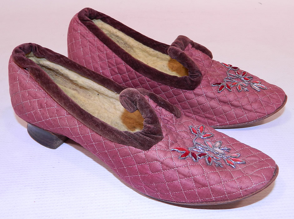 Victorian Burgundy Quilted Silk Steel Cut Beaded Velvet Trim Slipper Shoes
They are made of a dark red burgundy color silk fabric with quilted stitching, reddish brown velvet trim around the top and steel cut beaded ombre chenille embroidery work on the front toes.