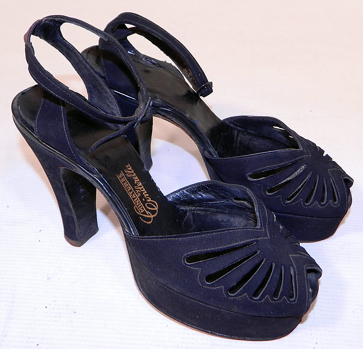 Vintage Miniatures by Cinderella Black Suede Leather Ankle Strap Platform Shoes
These sensational swing dance shoes pumps have adjustable buckle ankle straps, peek-a-boo open toes, a platform lift front and modified boulevard high heels. 