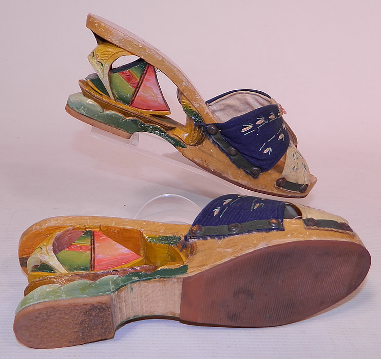 Vintage Philippines Hand Painted Carved Wooden Wedge Sailboat Mules Sandal Shoes
They are in good condition, with some wear, tiny dings, chips and nicks on the wood. These would make a great display piece and are truly a wonderful piece of hand crafted wearable retro shoe art!