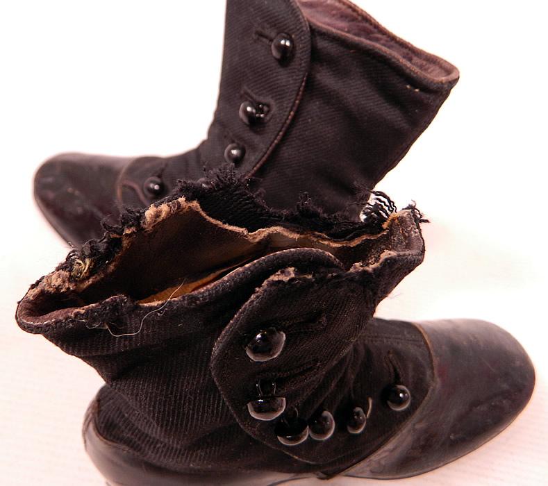 Victorian Black Wool & Leather High Button Baby Boots Childs Shoes
These charming child's high top button baby boots have been gently worn and are in good as-is condition, with some scuff marks on the leather and there is some fraying along the top of one shoe with a missing piece (see close-up). These are truly a quality made children's shoe!