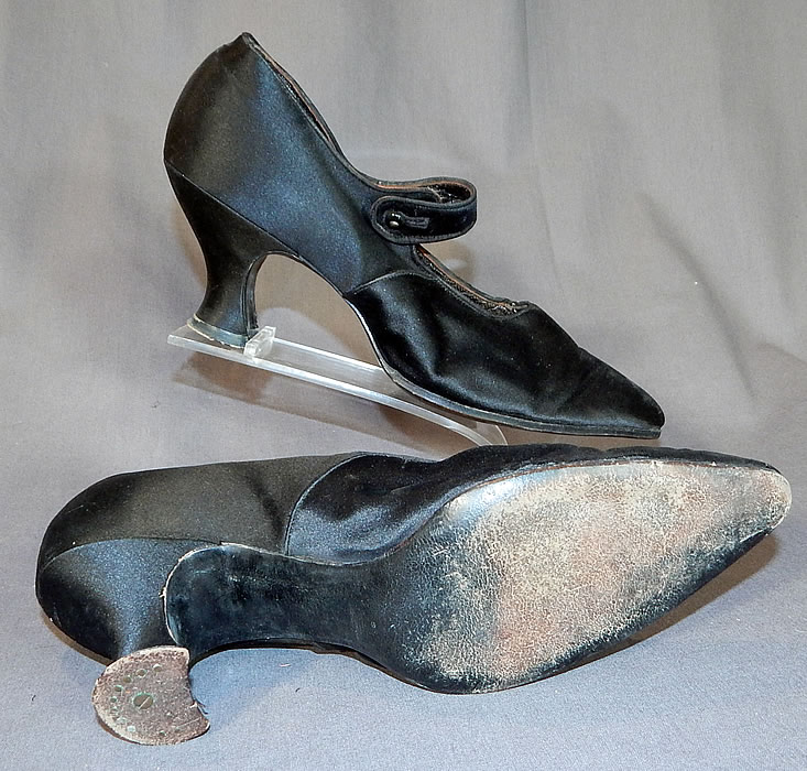 Edwardian Black Silk Satin Button Strap Mary Jane Pointed Toe Shoes
These womens Mary Jane style shoes have a button strap closure across the front instep vamps, pointed toes and silk covered French Louis XV spool heels. 